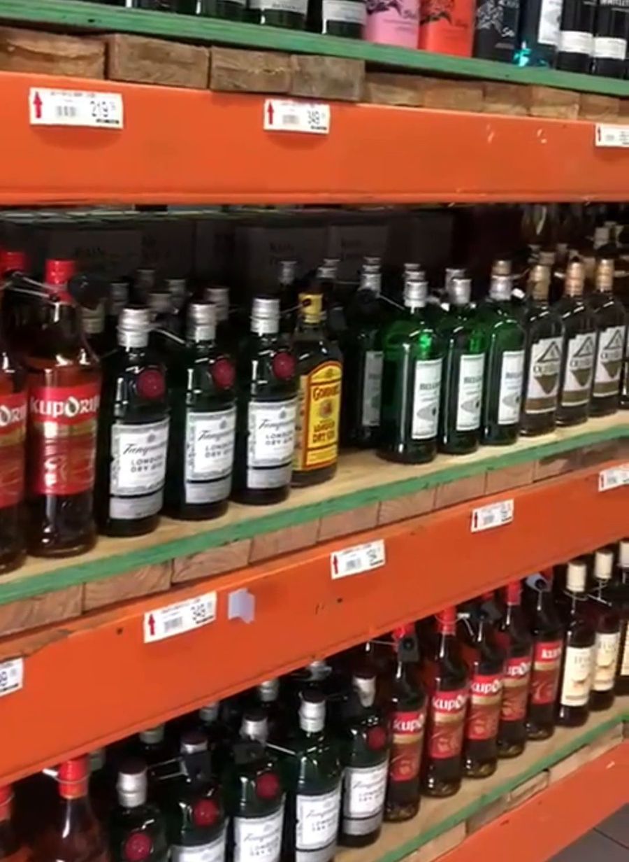 Spirits shelves at Varsity Blue Bottle Liquors