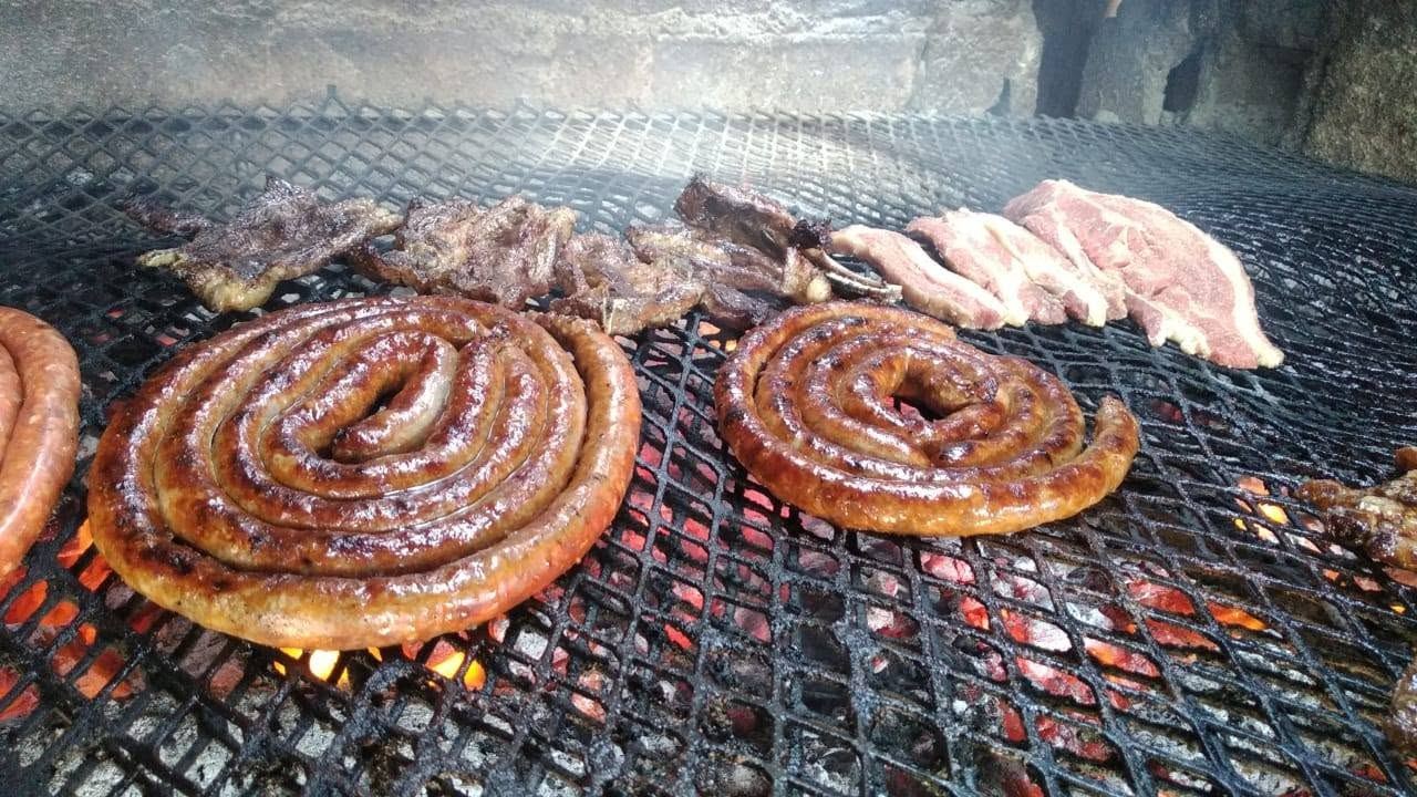 Tomato sausage, chops and steak on the braai at Varsity Butchery